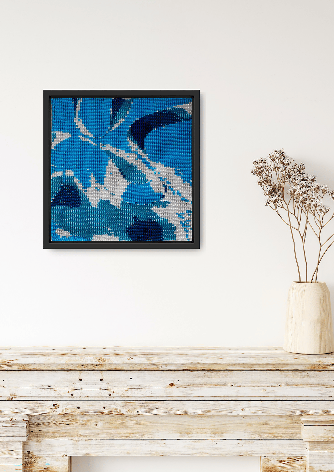 Handwoven indigo glass bead artwork styled in a room setting, traditional Indian handicraft interior decor.