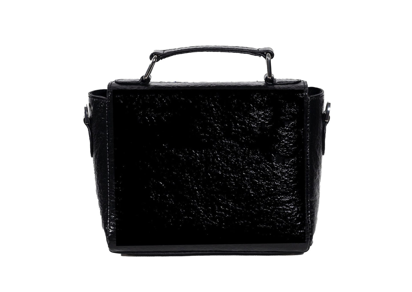 Rear view of geometric Czech glass bead patterns on a black structured bag, traditional Saurashtra handicraft.