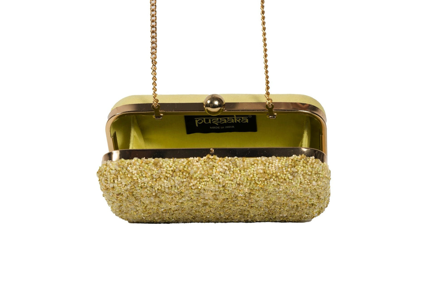 Inside view of shimmering yellow beadwork on a convertible chain strap clutch, Muradabad artisan craft.