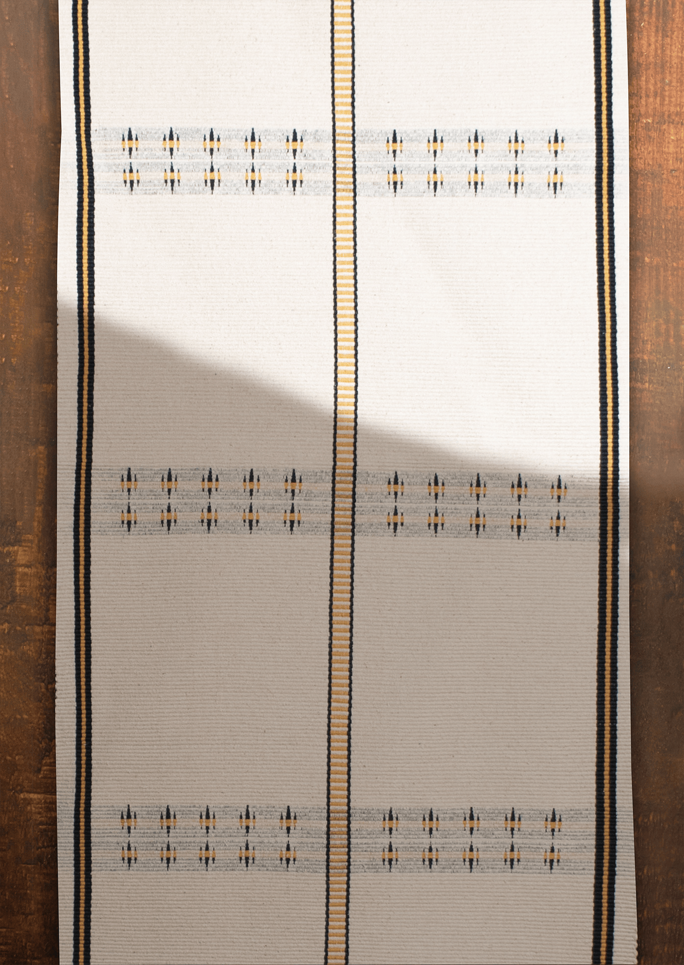 Handwoven cotton Konyak table runner with yellow accents, premium Naga loin loom textile.