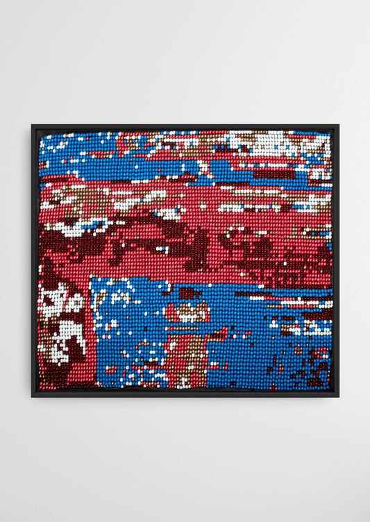 Framed red and blue geometric glass bead artwork, traditional Gujarati bead-loom wall decoration.