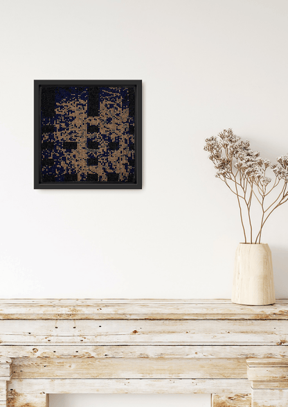 Glittering gold bead-loom artwork on a shelf, luxury Indian handicraft interior room decor.