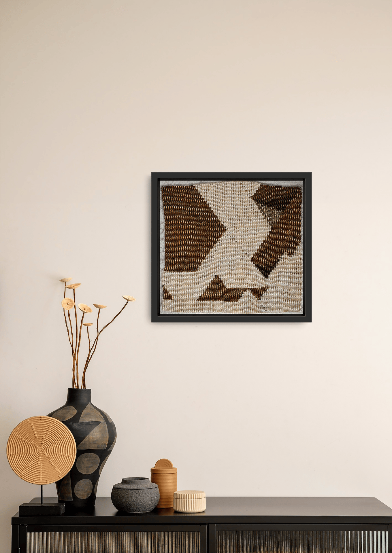 Framed earthy brown geometric glass bead-loom artwork, traditional Gujarati handicraft wall art.
