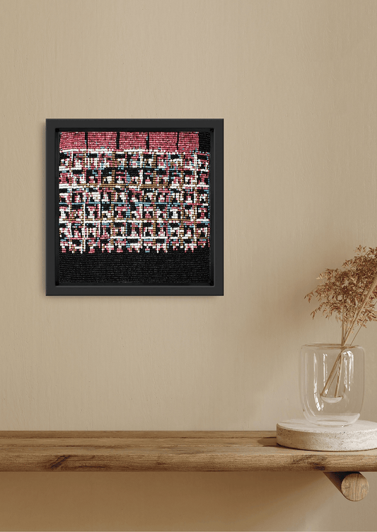 Framed pink and red abstract rows of glass bead artwork, handwoven Gujarati beadwork decor.