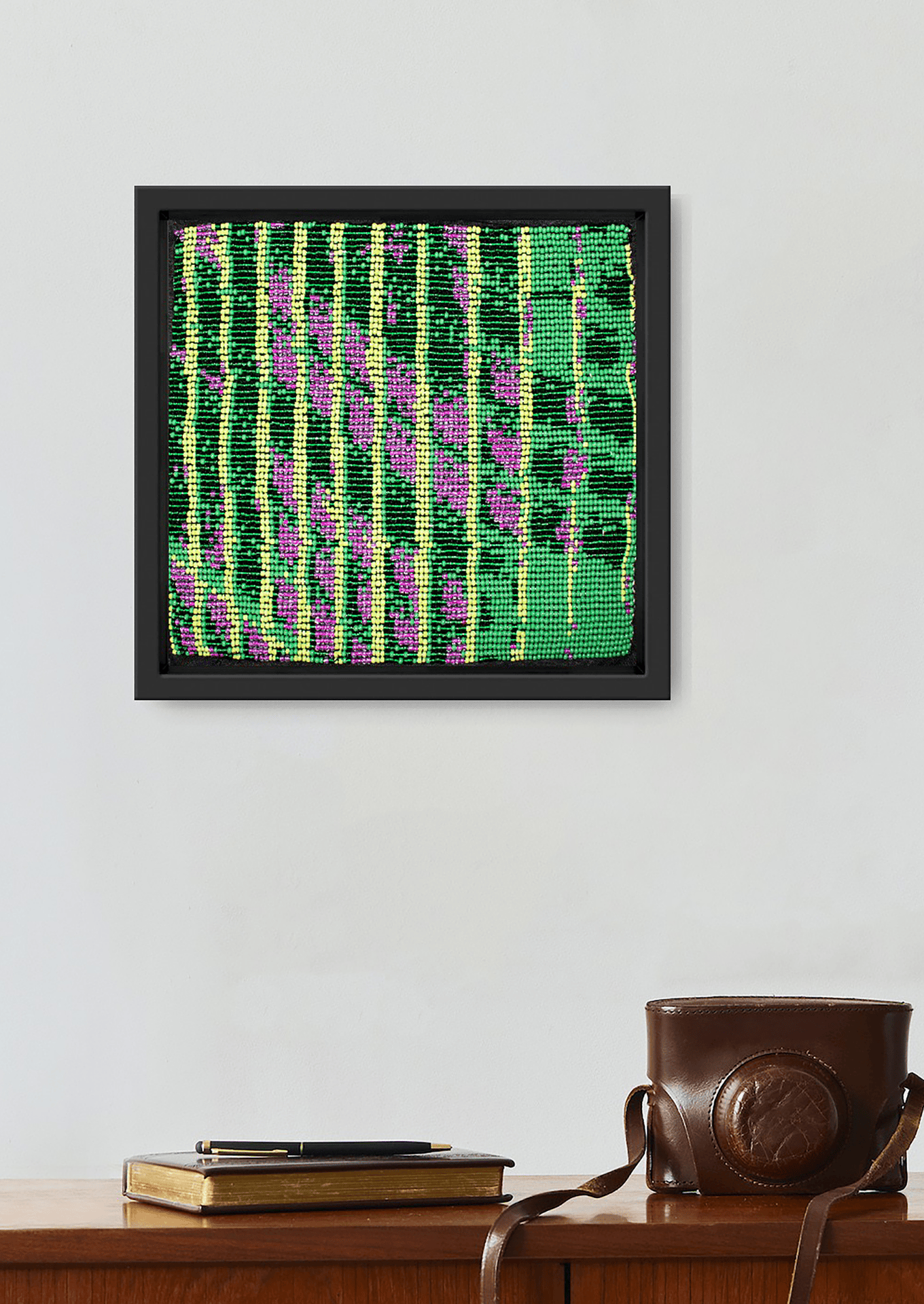 Soft lilac tone bead-loom piece styled next to dark furniture, traditional Indian room accessory.