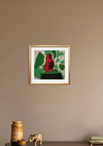 Young bird glass bead-loom piece styled on a minimalist wall, authentic Indian handicraft room art.