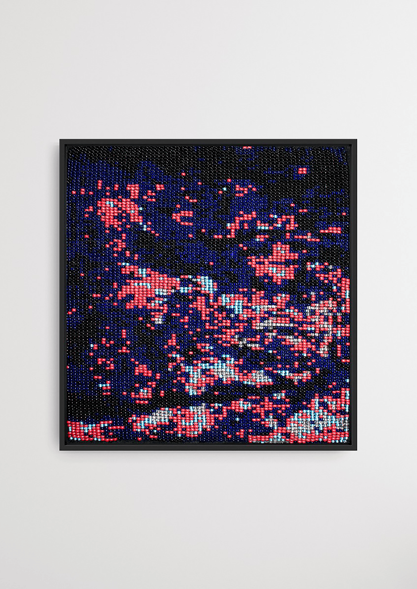 Framed dark background with dispersed pink glass bead artwork, traditional Gujarati handicraft wall decor.