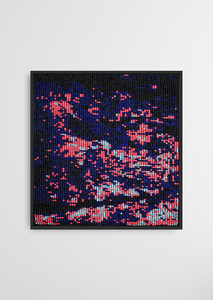 Framed dark background with dispersed pink glass bead artwork, traditional Gujarati handicraft wall decor.