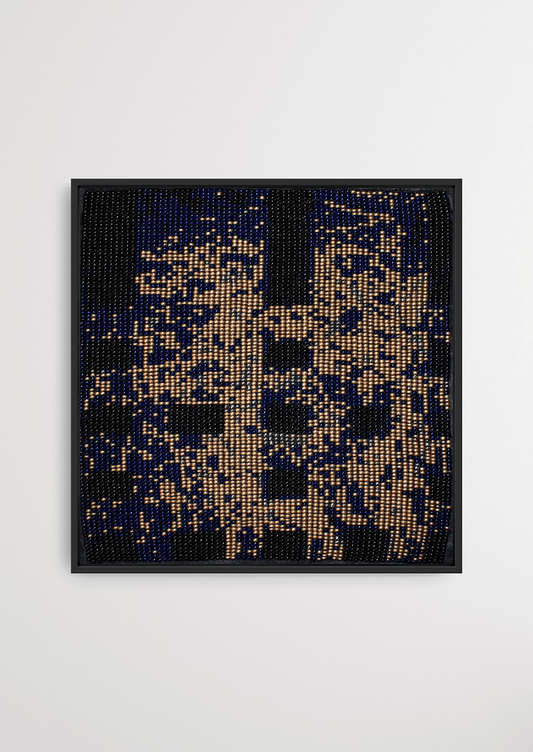 Framed dark background with gold vertical glass bead artwork, traditional Gujarati wall art.