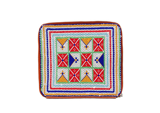 Vegan banana leather organizer with intricate floral beadwork, sustainable Indian handicraft.