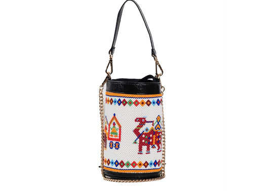 Cylindrical white beaded bag with red and blue palace motifs, Gujarati dal-moti handicraft.
