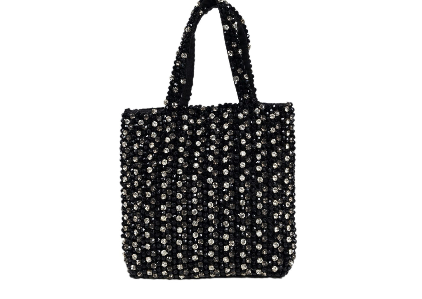 Black compact evening purse with a striking silver beaded burst pattern, handcrafted Indian artisanal accessory.