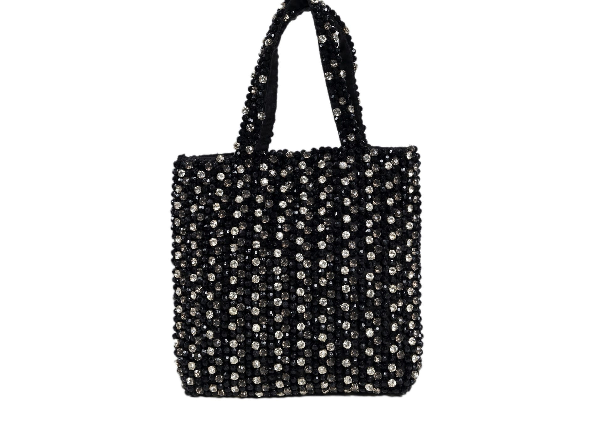 Black compact evening purse with a striking silver beaded burst pattern, handcrafted Indian artisanal accessory.