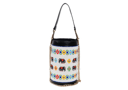White cylindrical bag with blue elephant beadwork, premium Gujarati artisanal accessory.