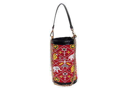 Red Variant of Vegan banana fiber bucket bag with intricate Gujarati beadwork, handcrafted premium Indian accessory.