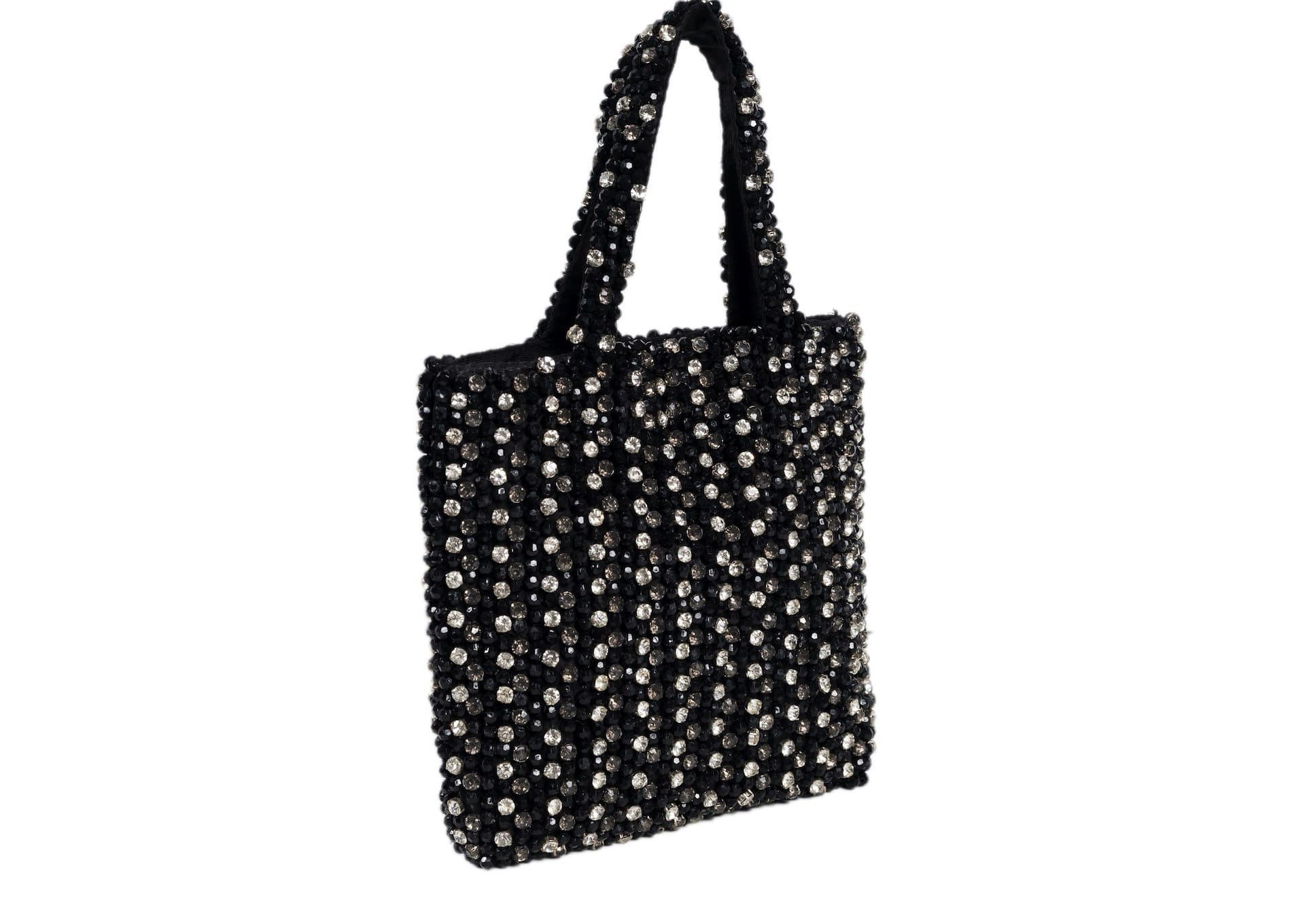 Black compact evening purse with a striking silver beaded burst pattern, handcrafted Indian artisanal accessory.