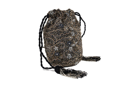 Another angle of elongated silver beaded evening purse with tassels, handcrafted premium Indian accessory.