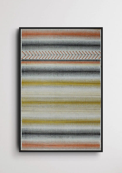 Woven bamboo scroll wall art with yellow and black accents, traditional Nagaland home decor.