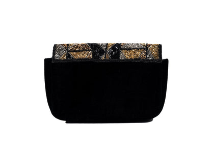 Rear view of bold triangle and square beadwork pattern on an expandable clutch, Lucknow artisan fashion.