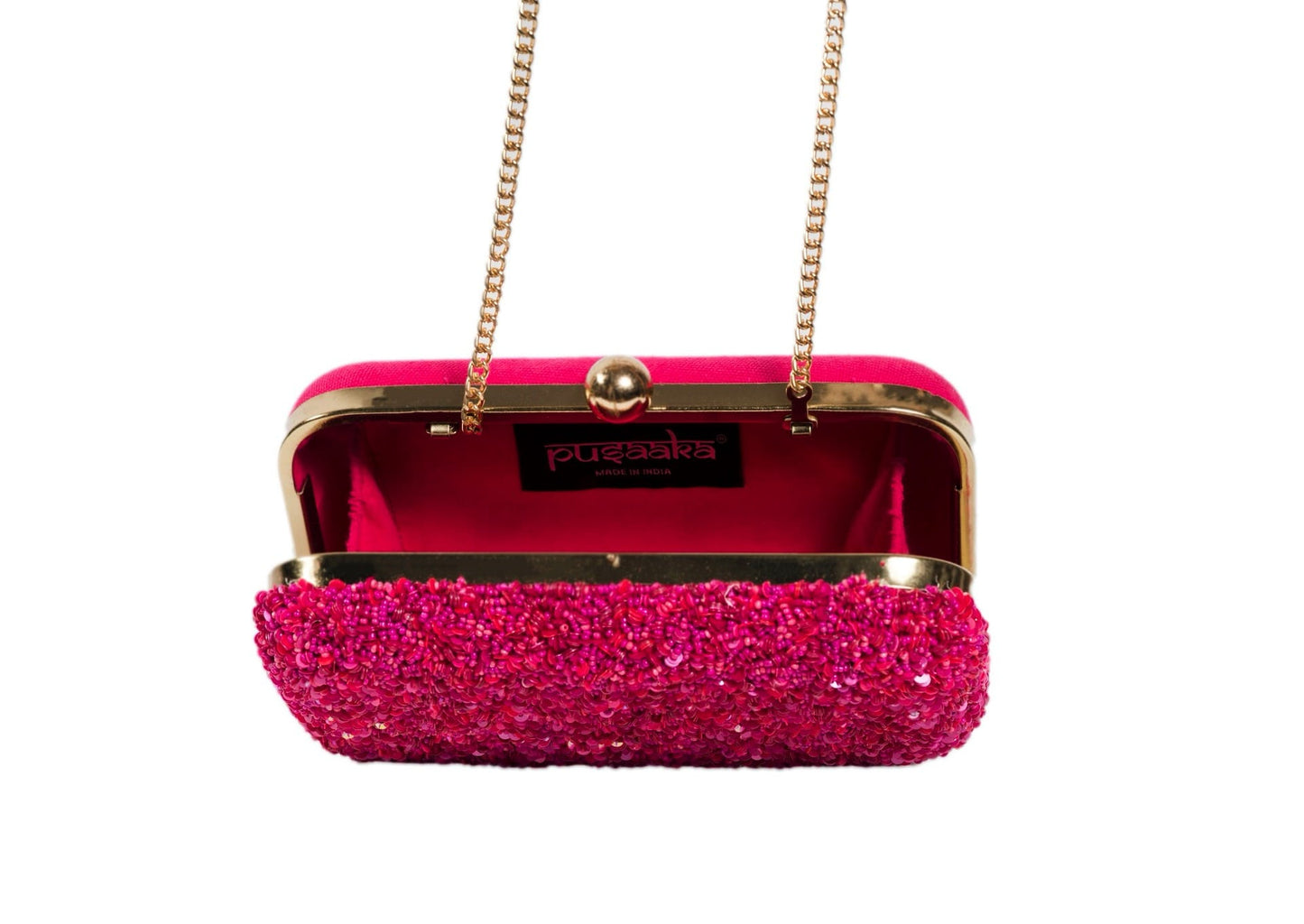 Inside view of vibrant fuchsia pink beaded evening clutch, handcrafted premium Indian luxury accessory.