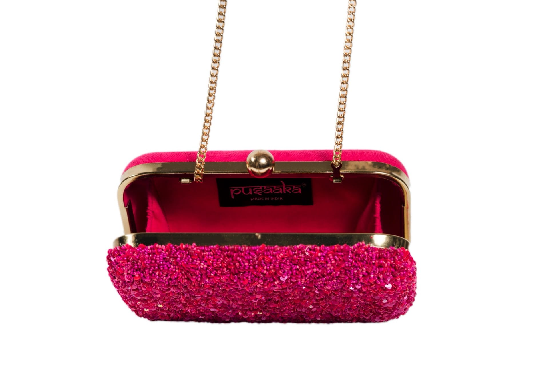 Inside view of vibrant fuchsia pink beaded evening clutch, handcrafted premium Indian luxury accessory.