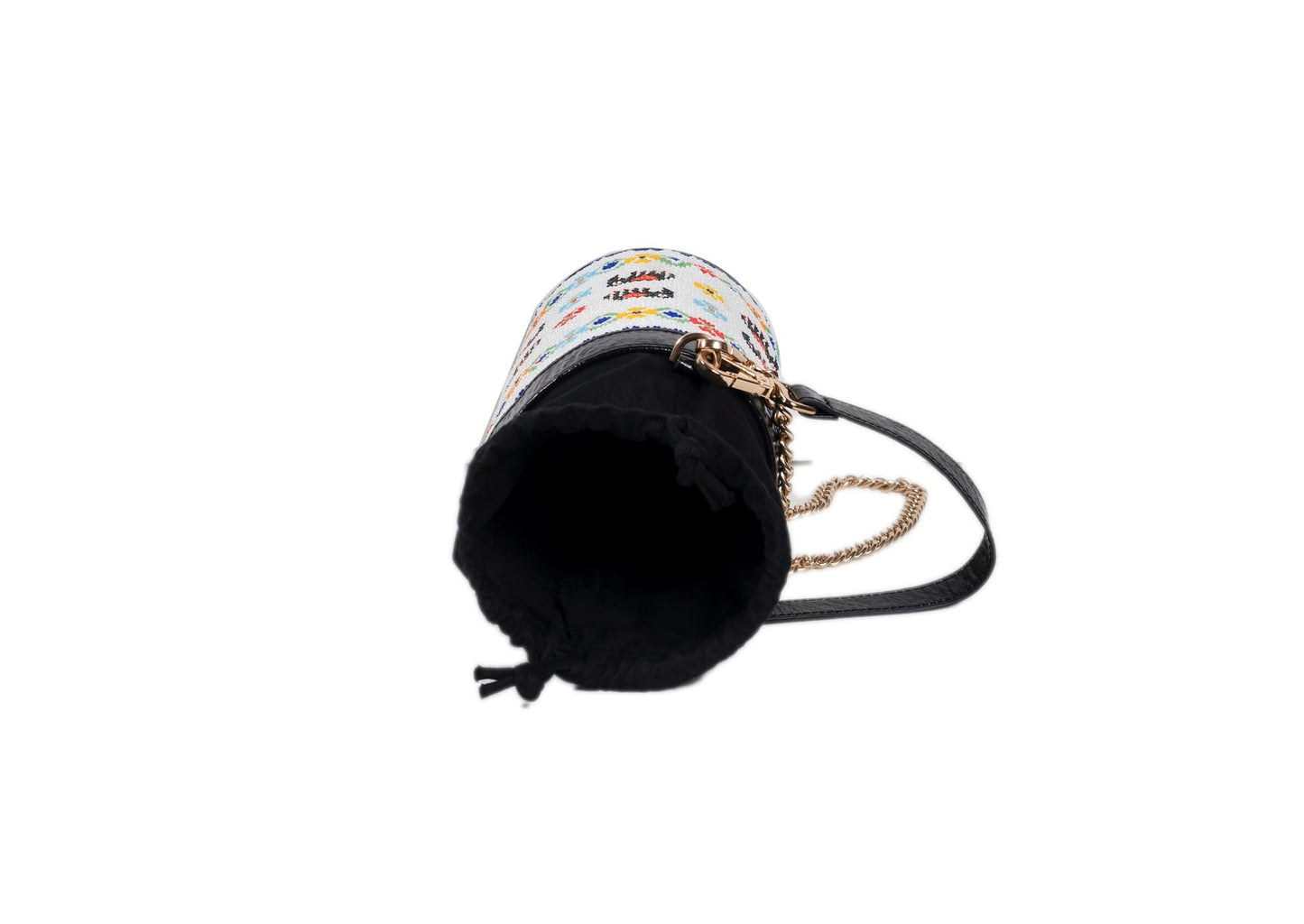 Interior view of traditional Czech glass bead elephant parade motif on a structured Indian luxury bag.