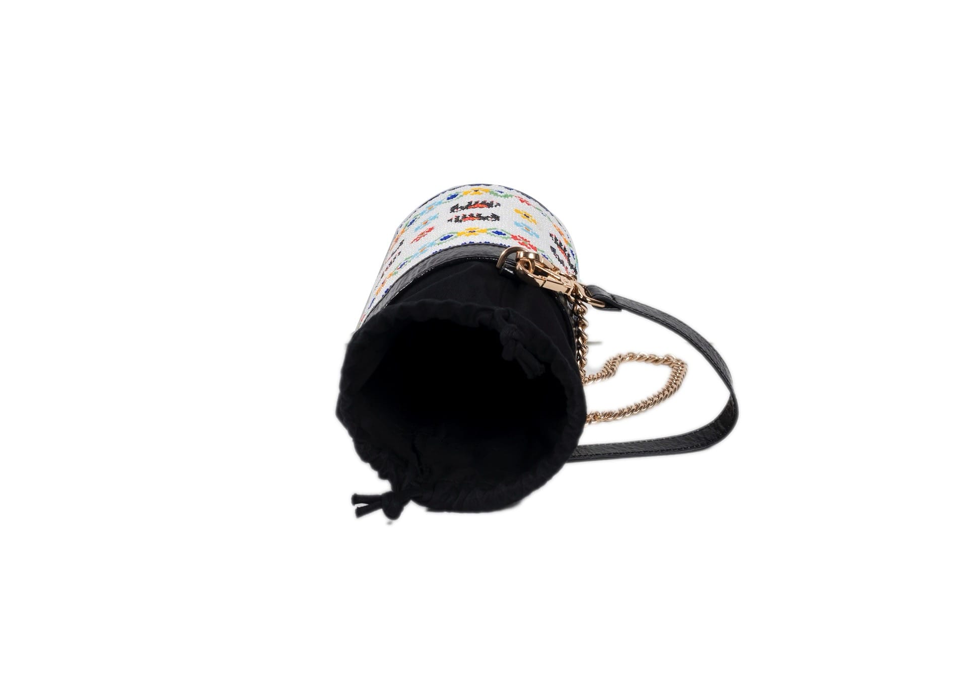 Interior view of traditional Czech glass bead elephant parade motif on a structured Indian luxury bag.