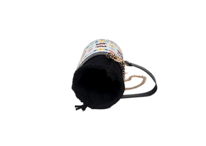 Interior view of traditional Czech glass bead elephant parade motif on a structured Indian luxury bag.