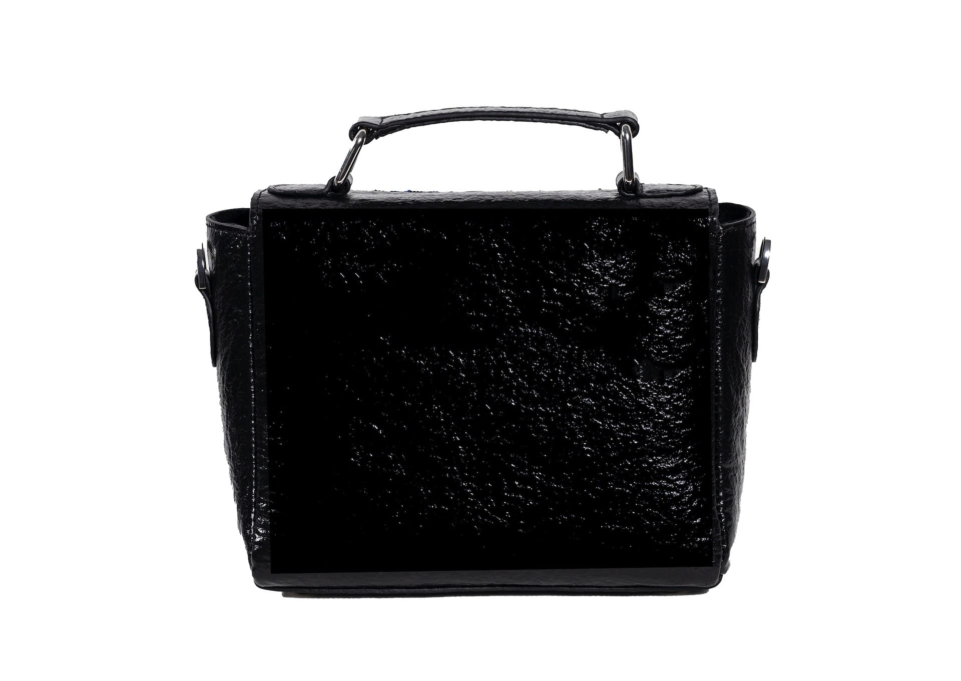 Rear view of geometric Czech glass bead patterns on a black structured bag, traditional Saurashtra handicraft.