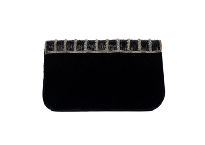 Rear view of black evening purse with silver wave pattern beadwork, premium Indian handcrafted accessory.