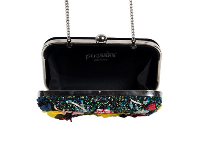 Inside view of deep teal evening clutch with vibrant wildflower beadwork, premium Indian handcrafted accessory.