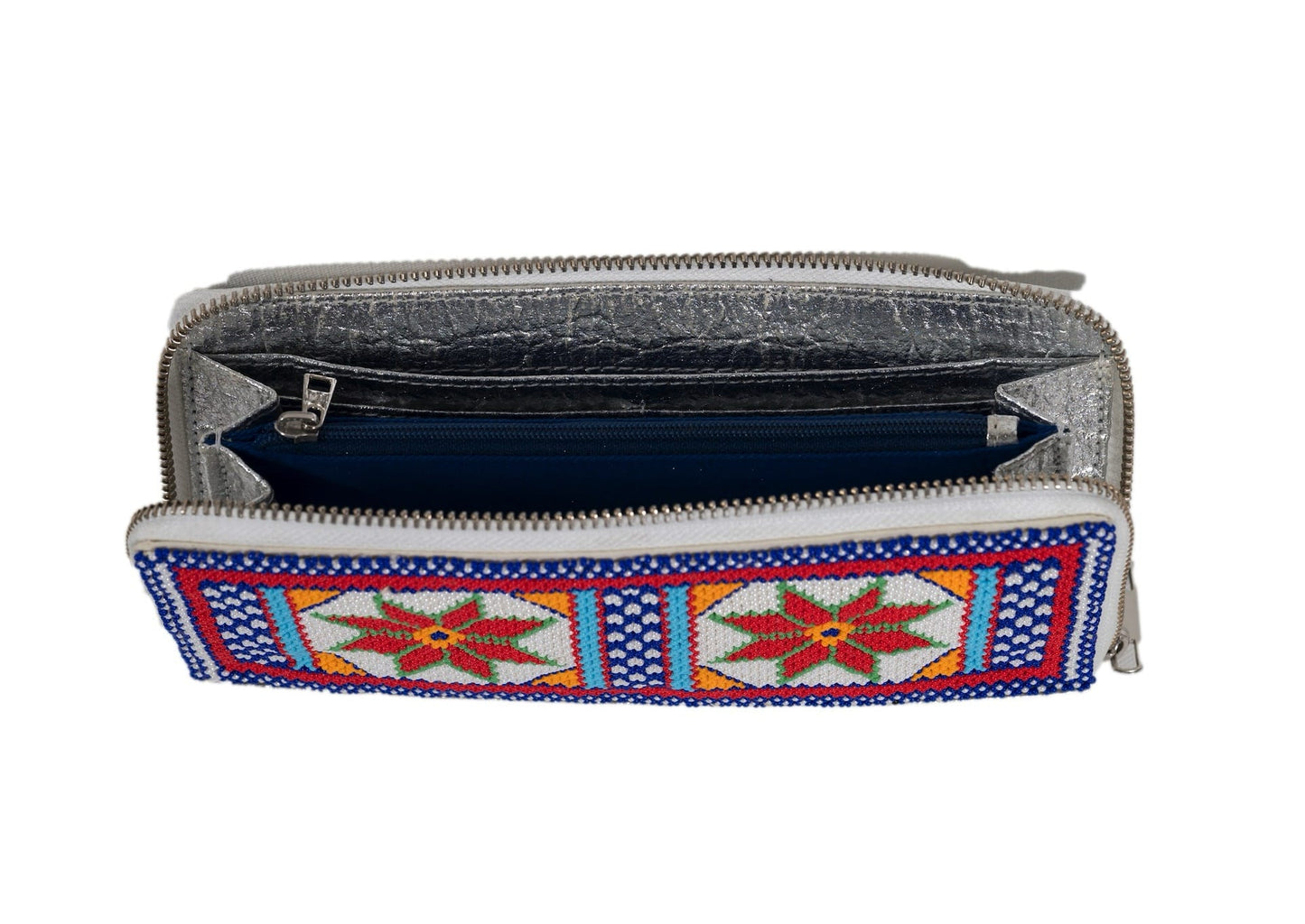 Inside view of handcrafted Gujarati silver beadwork wallet with red star motifs, premium Indian accessory.
