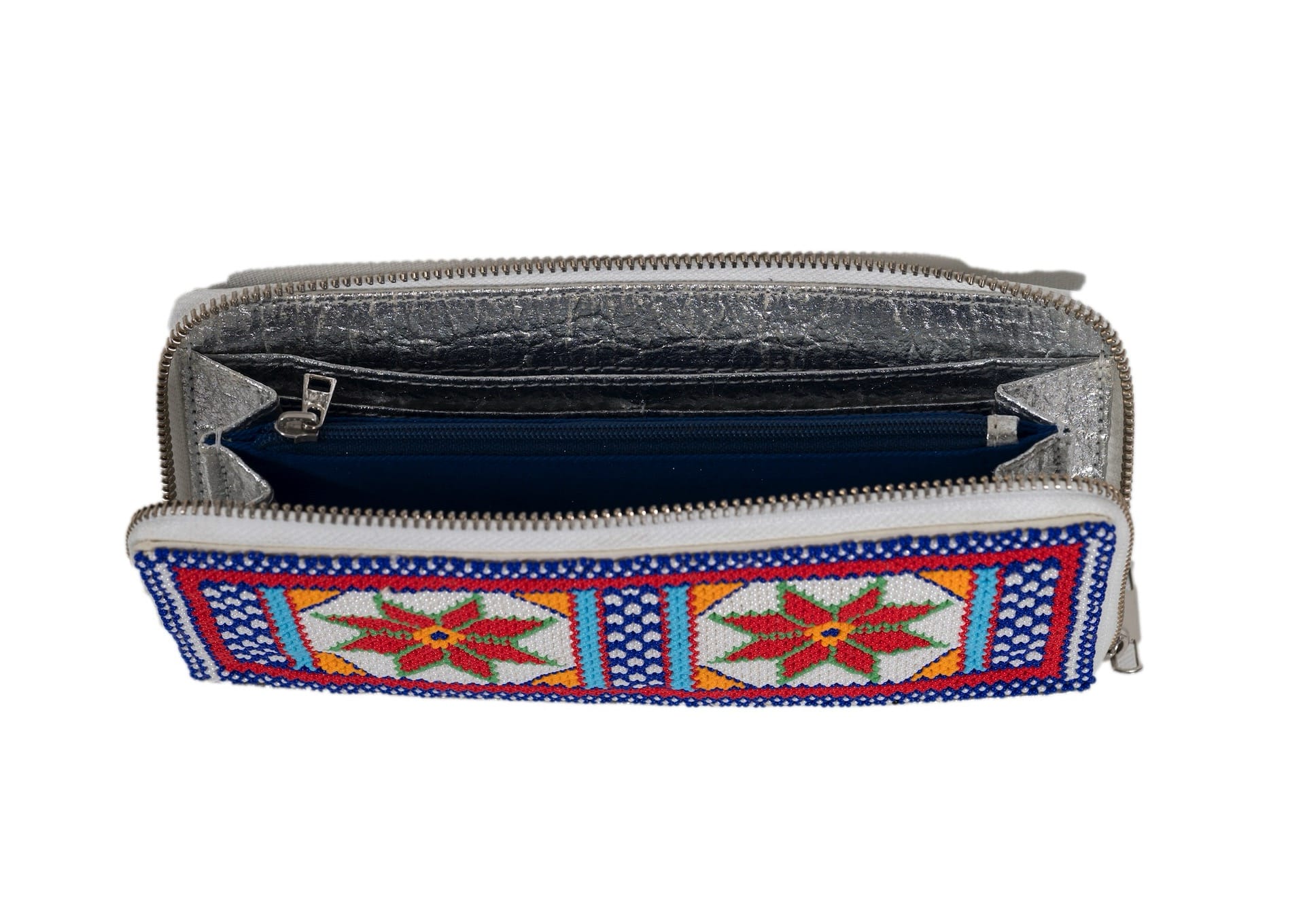 Inside view of handcrafted Gujarati silver beadwork wallet with red star motifs, premium Indian accessory.