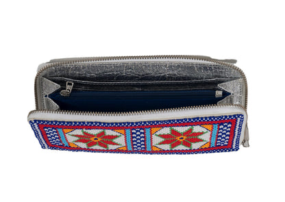 Inside view of handcrafted Gujarati silver beadwork wallet with red star motifs, premium Indian accessory.