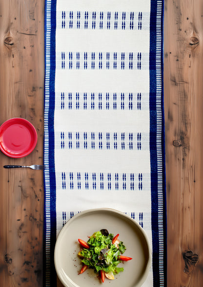 Authentic Nagaland loin loom runner with blue accents on a wooden table, premium Indian home decor.