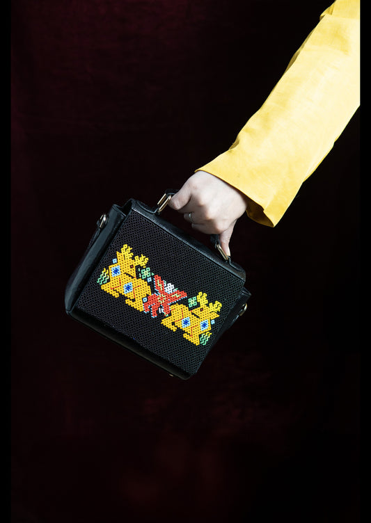 dhara jungle beadwork purse