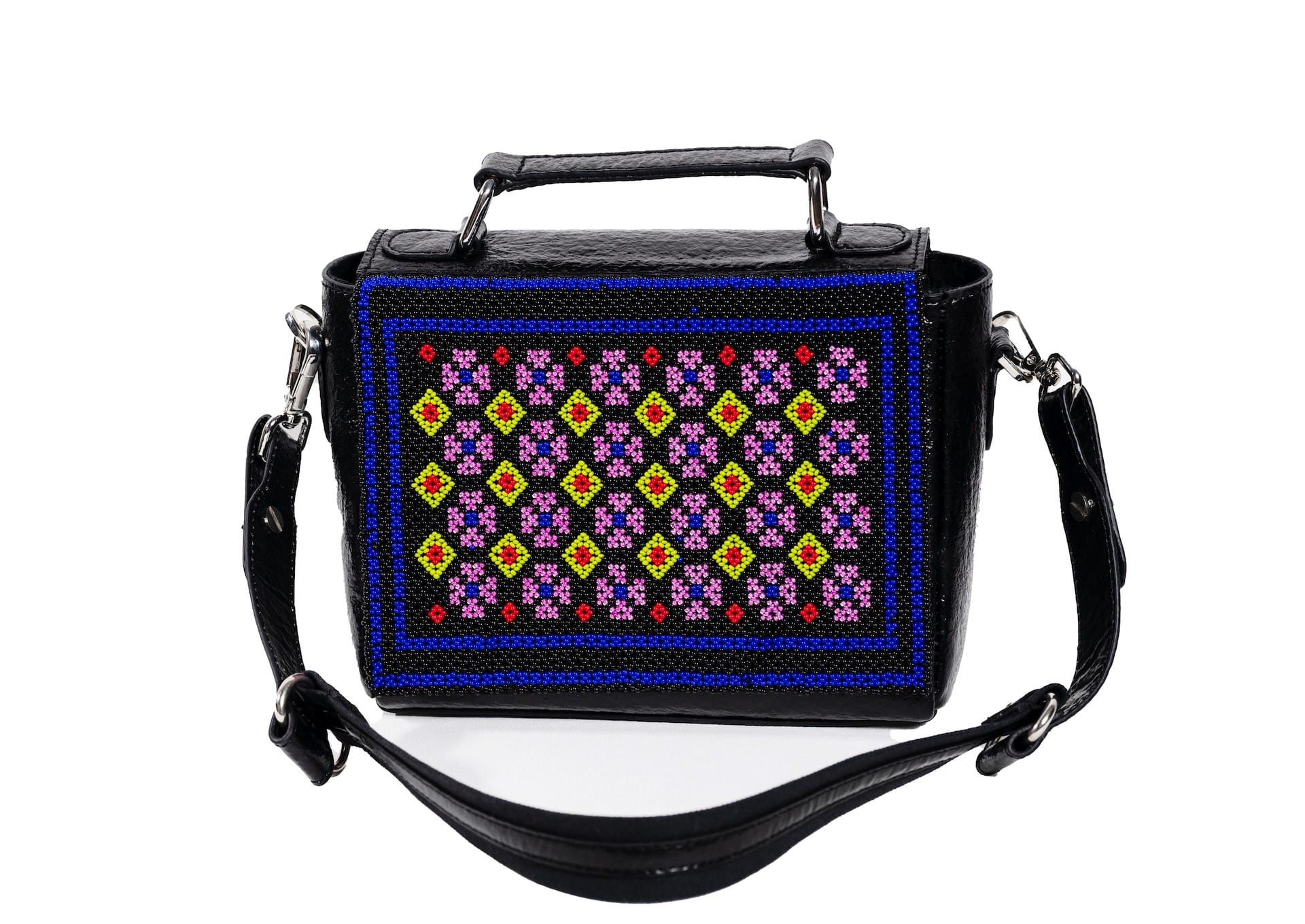 Intricate Czech glass geometric beadwork framed by cobalt blue, authentic Gujarati artisan bag.