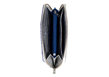 Different compartments in handcrafted Gujarati silver beadwork wallet with red star motifs, premium Indian accessory.