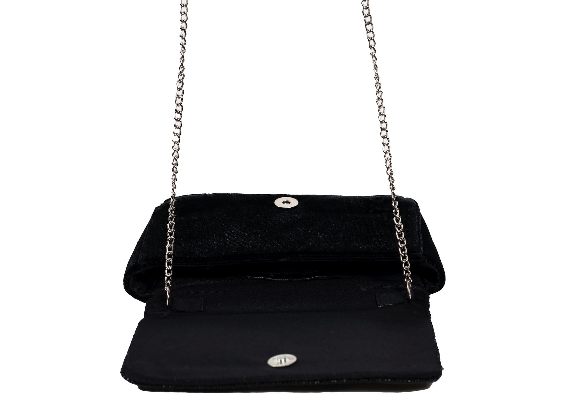Inside view of black evening purse with silver wave pattern beadwork, premium Indian handcrafted accessory.