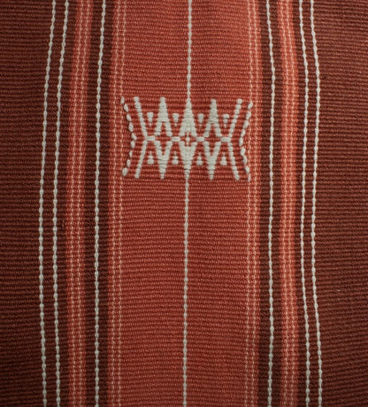 Detailed view of cozy handwoven cotton textures, luxury Indian artisanal home accessory.