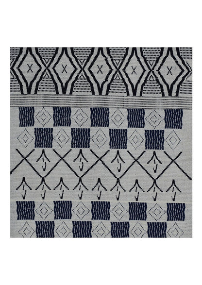 Framed 16x16 inch black and white woven cotton textile, traditional Nagaland backstrap loom art.