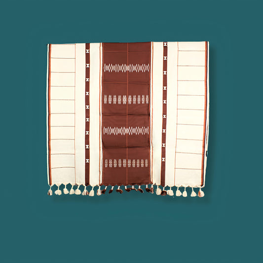 Cozy brown and cream cotton throw folded elegantly, premium Indian handcrafted home accessory.