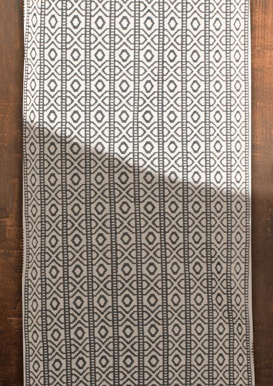 Black and white geometric pattern Yimchungru table runner, traditional Naga loin loom art.
